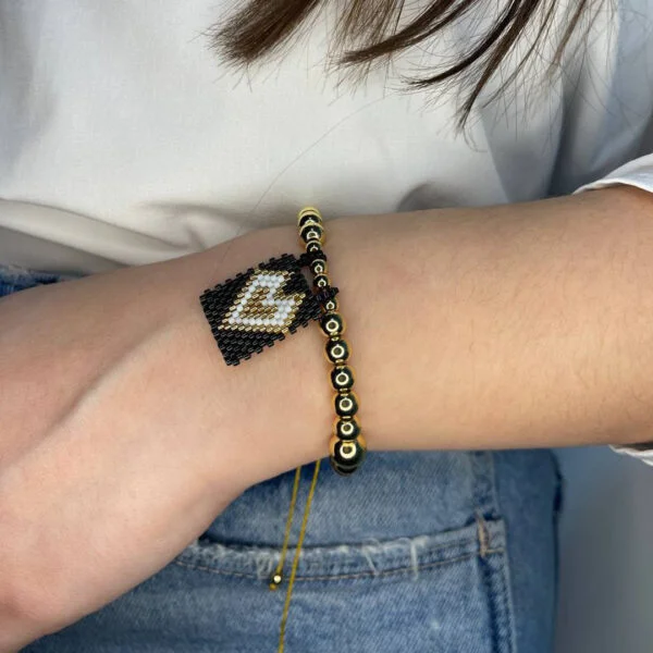 Beautiful adjustable bracelet with Black heart charm