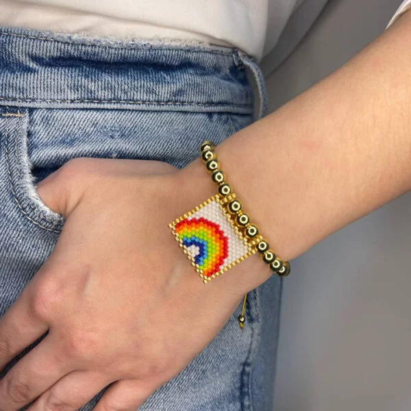 Adjustable rainbow bracelets white background