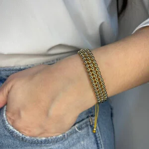 Bracelet with 3 lines in 1 with adjustable golden balls